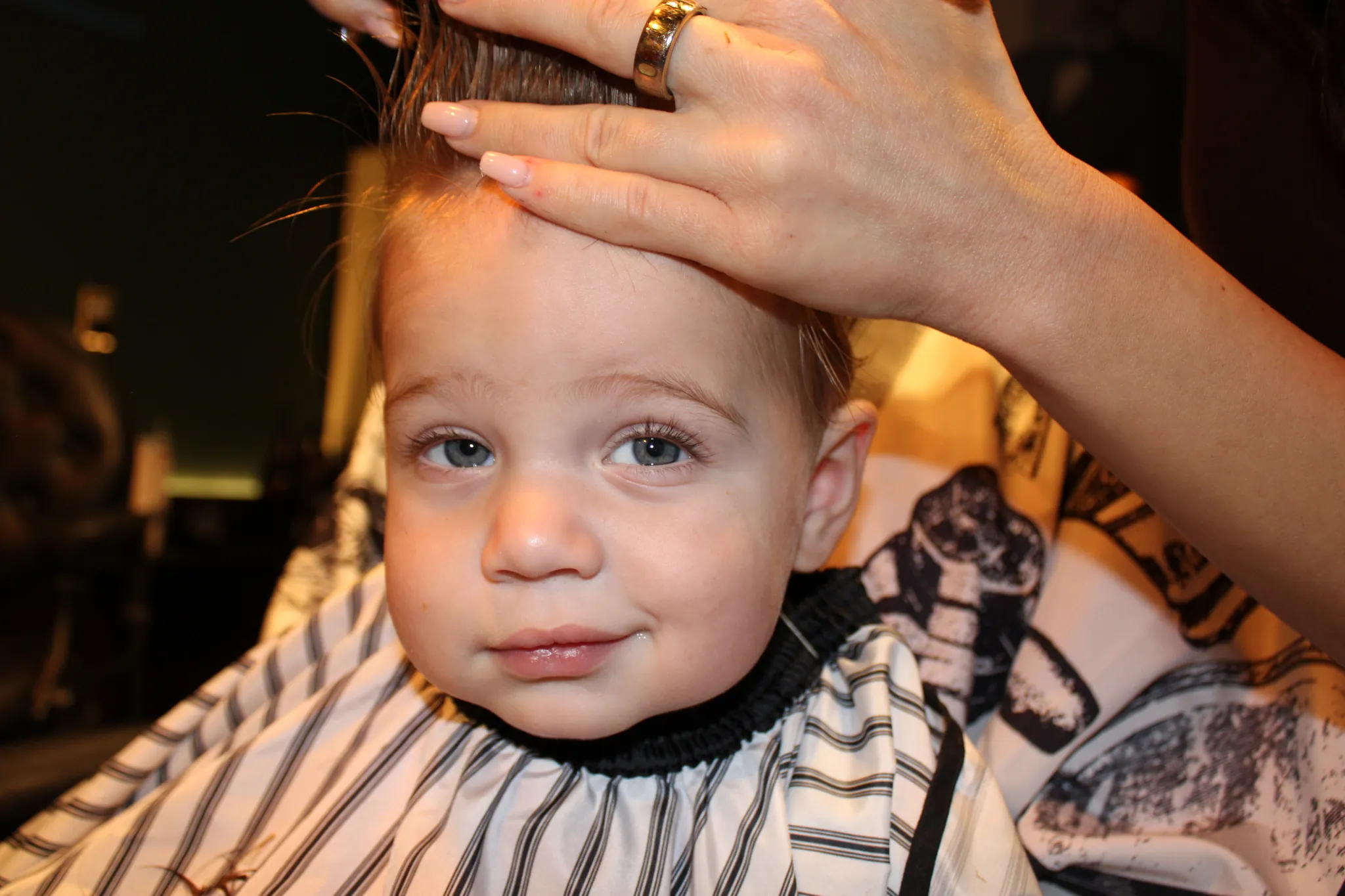 A child's haircut at Vintage Blade Barbershop in Bonita Springs
