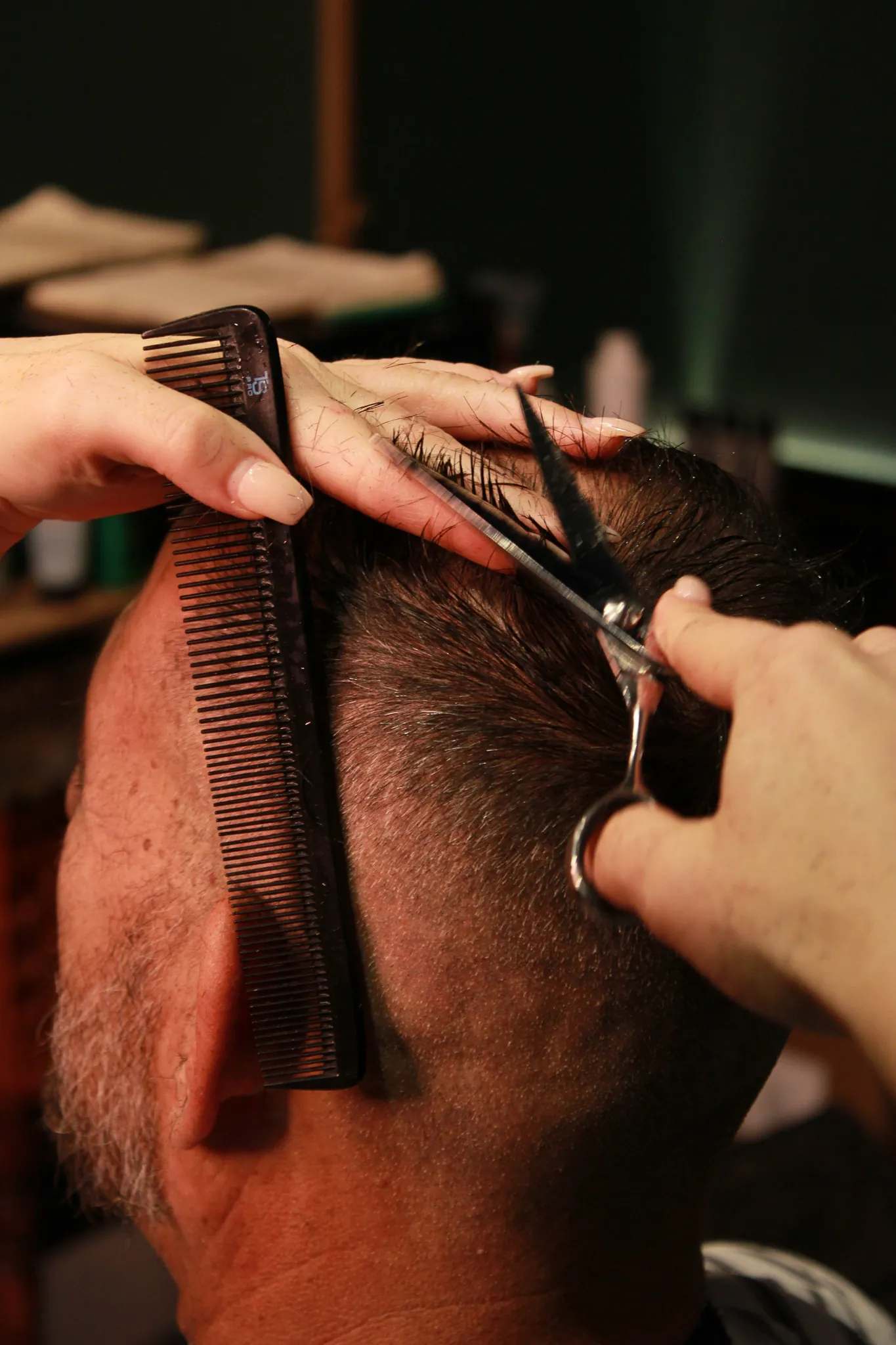 Details at Vintage Blade Barbershop — brass, mahogany and blades